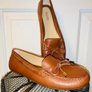 MICHAEL KORS brown slip ons